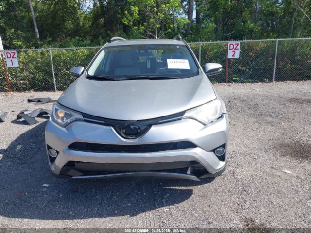 JTMWFREV9JJ203353 Toyota Rav4 Xle