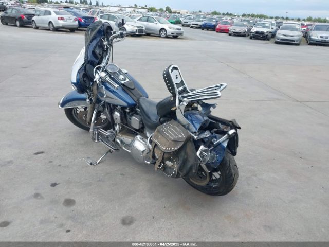 1999 HARLEY-DAVIDSON FLSTC 1HD1BJL56XY035535 Photo 2