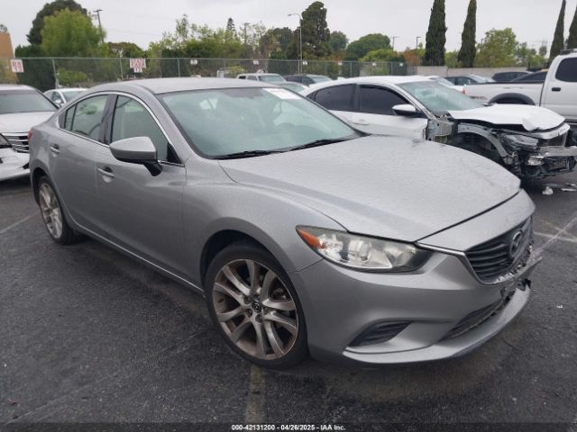 JM1GJ1V60E1141831 auction archive image