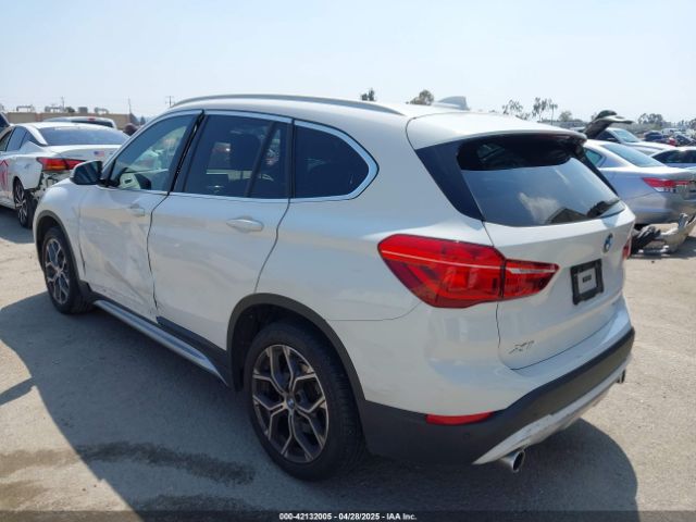 2021 BMW X1 WBXJG7C01M3M73496 Photo 2