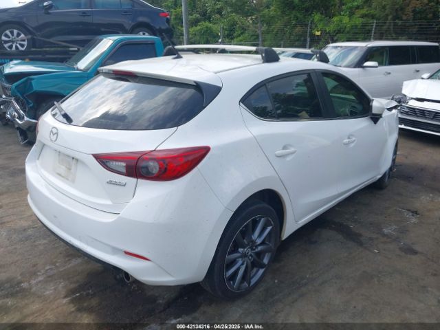 3MZBN1L39JM184985 Mazda Mazda3 Touring