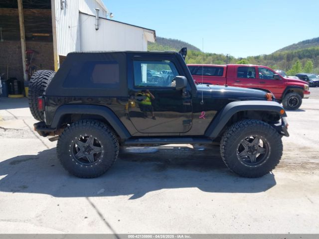 1C4AJWAG7EL147499 Jeep Wrangler Sport