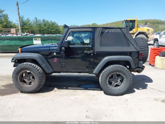 1C4AJWAG7EL147499 Jeep Wrangler Sport