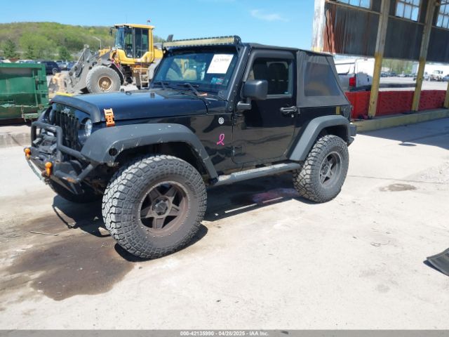 1C4AJWAG7EL147499 Jeep Wrangler Sport