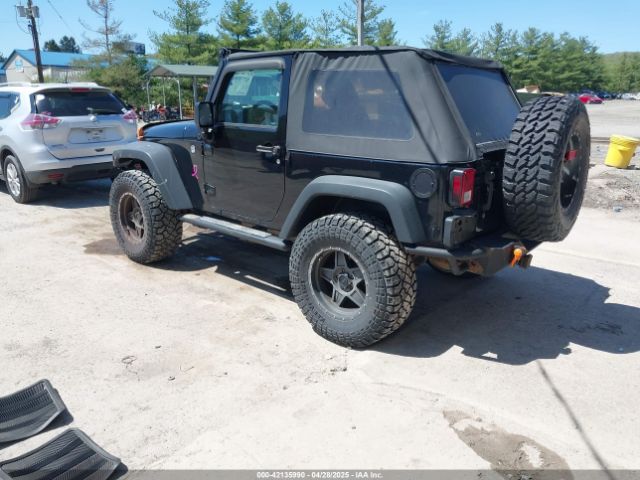 1C4AJWAG7EL147499 Jeep Wrangler Sport