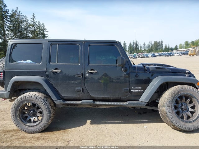 1C4BJWDG9FL750049 Jeep Wrangler Unlimited Sport