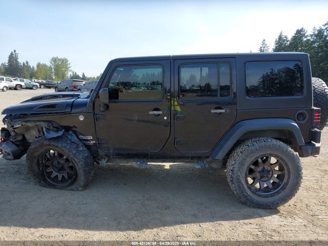 1C4BJWDG9FL750049 Jeep Wrangler Unlimited Sport