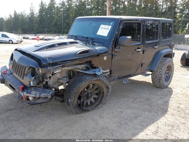 1C4BJWDG9FL750049 Jeep Wrangler Unlimited Sport