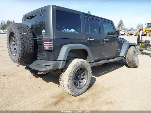 1C4BJWDG9FL750049 Jeep Wrangler Unlimited Sport