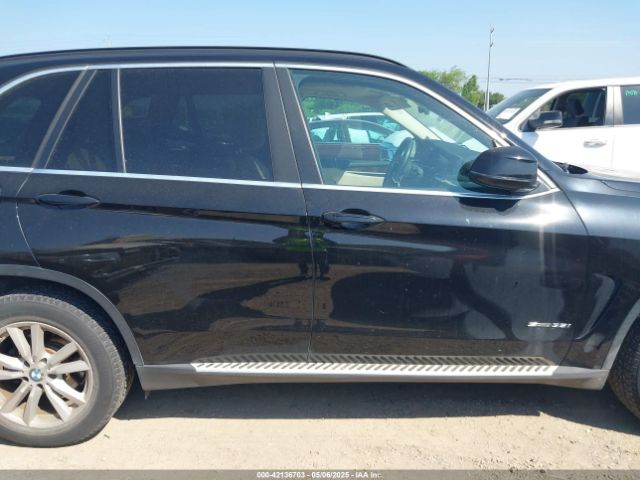 5UXKR2C57E0H31261 BMW 2014
