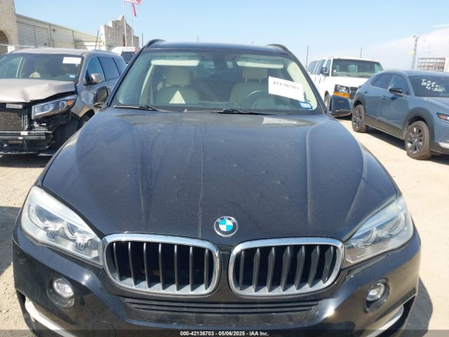5UXKR2C57E0H31261 BMW 2014