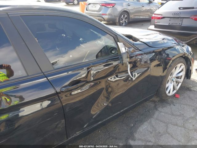 WBA8A9C5XJAD27898 BMW 320i