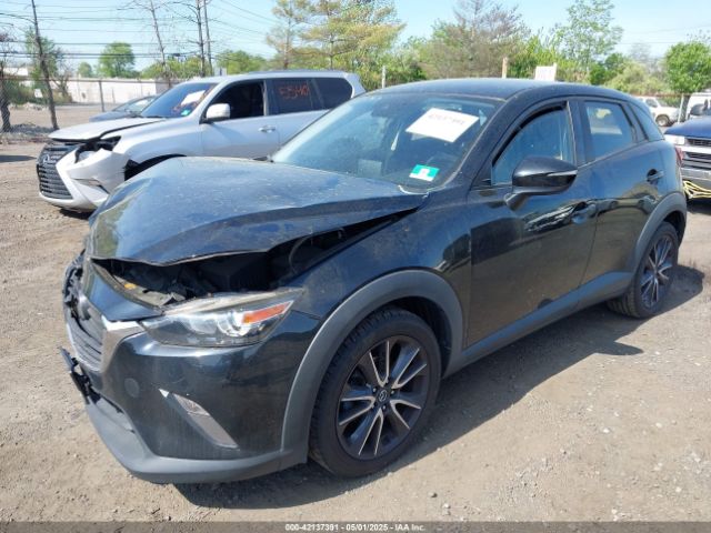 JM1DKDC70J0329410 Mazda Cx-3 Touring