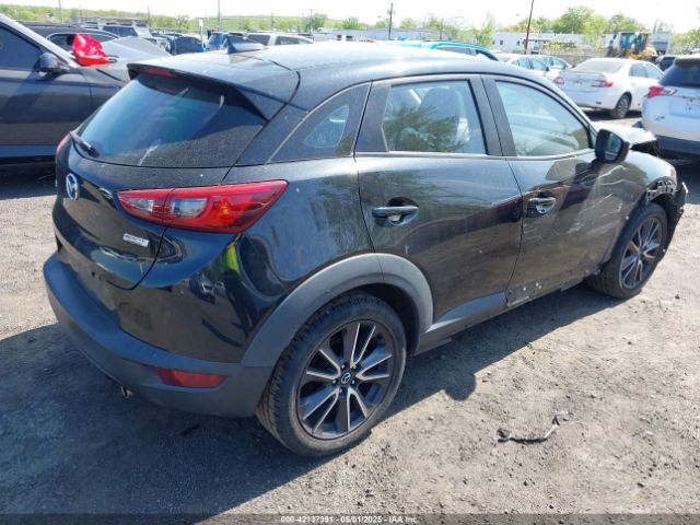 JM1DKDC70J0329410 Mazda Cx-3 Touring