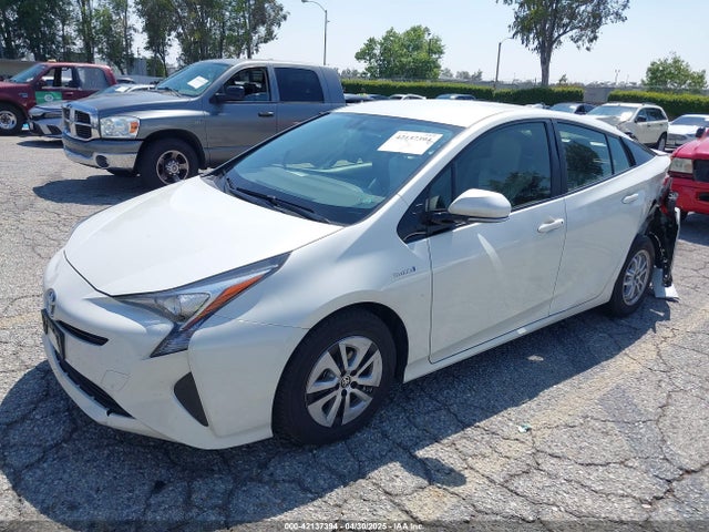JTDKARFUXG3511034 Toyota Prius Three