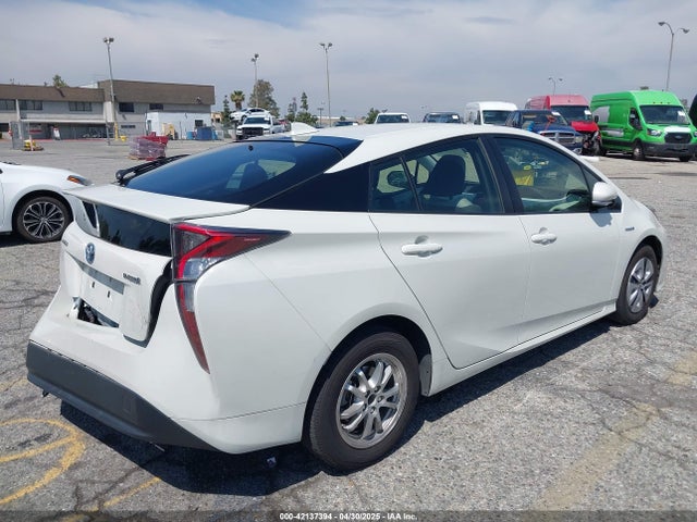 JTDKARFUXG3511034 Toyota Prius Three