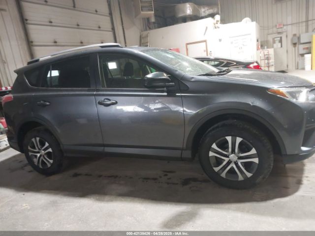 JTMZFREV9JD133607 Toyota RAV4 LE