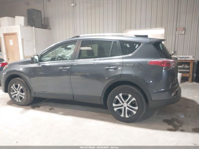 JTMZFREV9JD133607 Toyota RAV4 LE