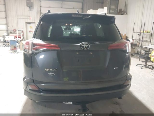 JTMZFREV9JD133607 Toyota RAV4 LE