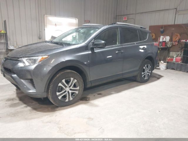 JTMZFREV9JD133607 Toyota RAV4 LE