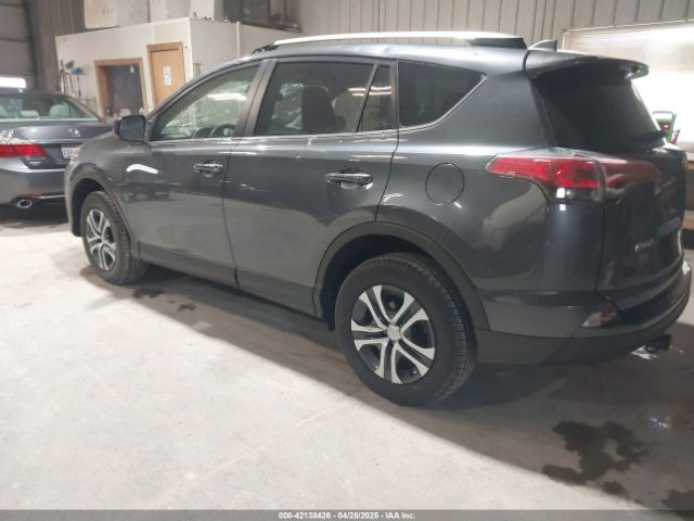 JTMZFREV9JD133607 Toyota RAV4 LE
