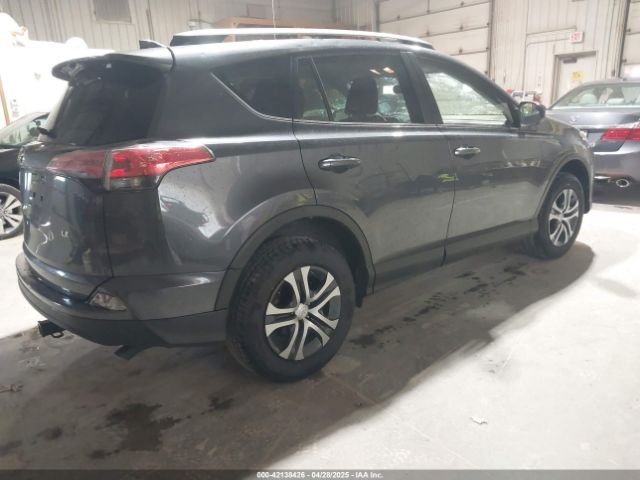 JTMZFREV9JD133607 Toyota RAV4 LE