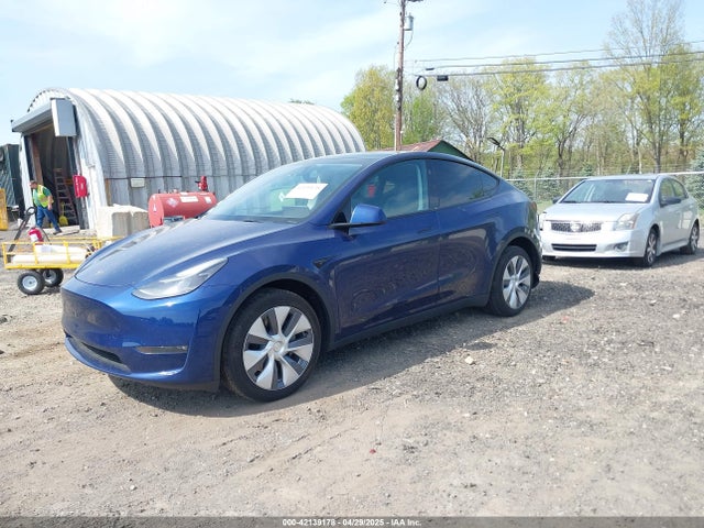 2023 TESLA MODEL Y 7SAYGDEE0PF850980 Photo 1