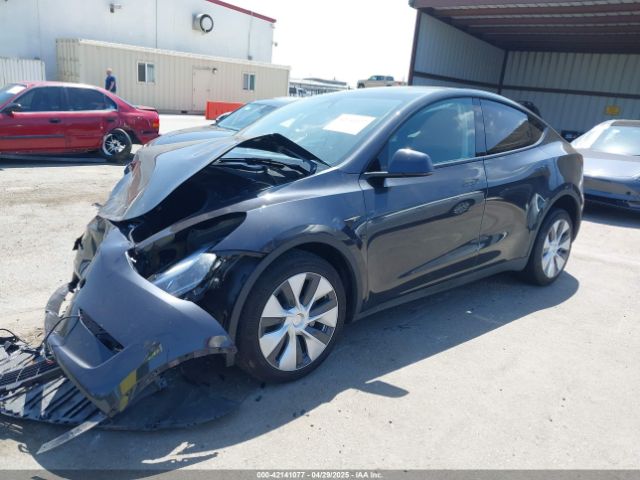 2024 TESLA MODEL Y 7SAYGDED9RF053945 Photo 1