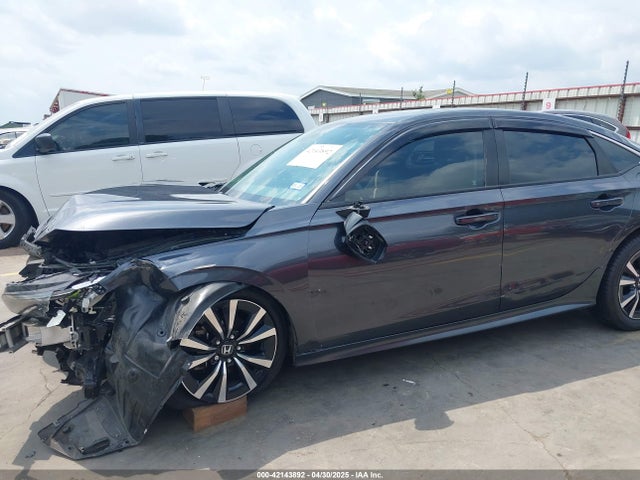 2HGFE1F76NH319493 Honda l15by