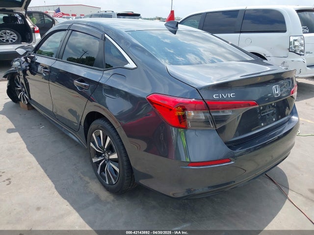 2HGFE1F76NH319493 Honda l15by