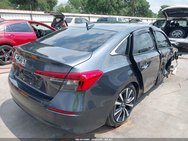 2HGFE1F76NH319493 Honda l15by