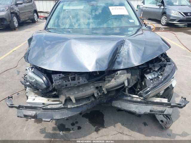 2HGFE1F76NH319493 Honda l15by