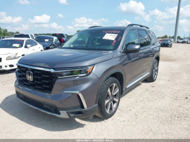 5FNYG1H82PB010622 Honda Pilot Awd Elite