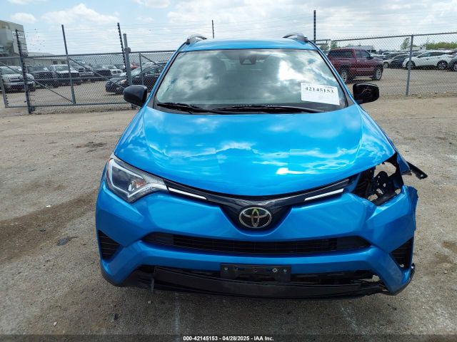 JTMZFREV5JD129862 Toyota RAV4 LE