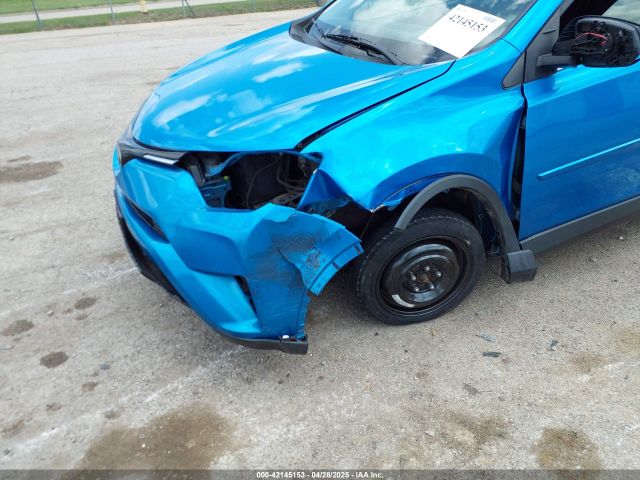 JTMZFREV5JD129862 Toyota RAV4 LE