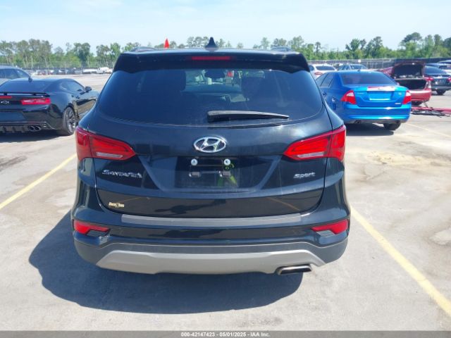 5NMZU3LB4HH024307 Hyundai Santa Fe Sport 2.4l