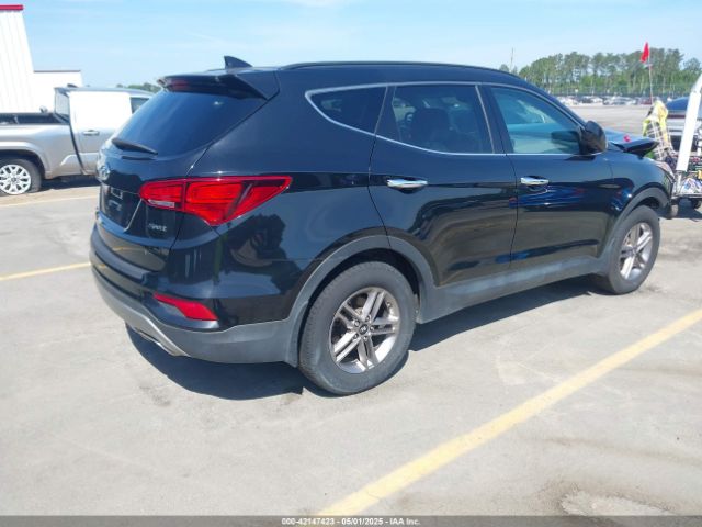 5NMZU3LB4HH024307 Hyundai Santa Fe Sport 2.4l