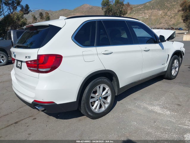5UXKR2C58E0H31978 BMW 2014