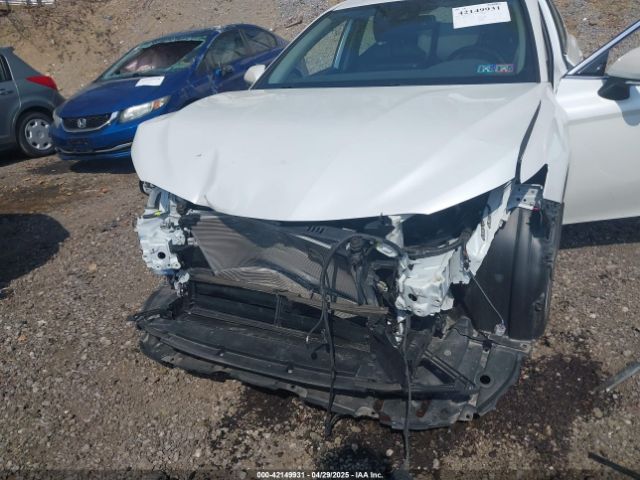 4T1F31AK8NU574042 Toyota Camry Xle Hybrid