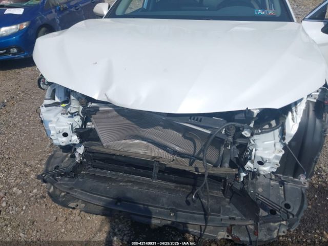 4T1F31AK8NU574042 Toyota Camry Xle Hybrid
