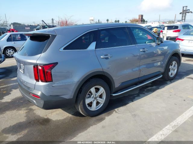 5XYRGDLC2MG038877 KIA SORENTO LX