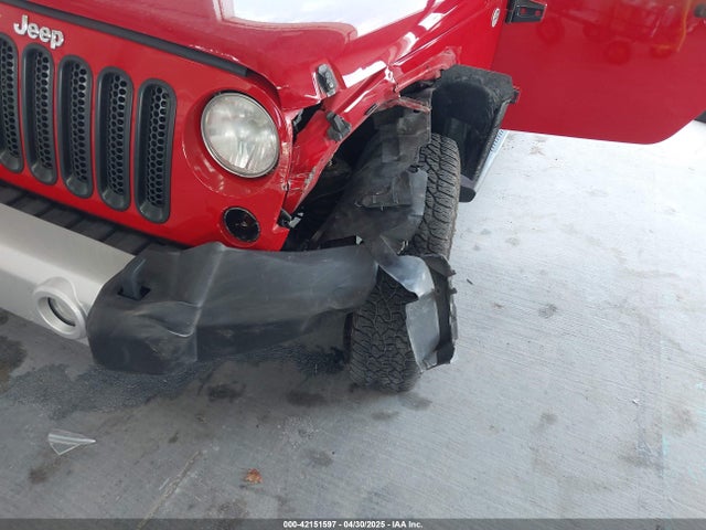 1C4BJWEGXEL179054 Jeep Wrangler Unlimited Sahara