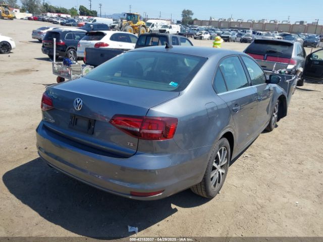 3VWDB7AJ7JM228990 Volkswagen Jetta 1.4t Se/1.4t Wolfsburg Edition