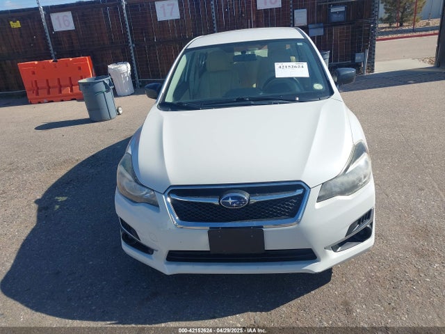 JF1GJAA61GG013965 Subaru Impreza 2.0i