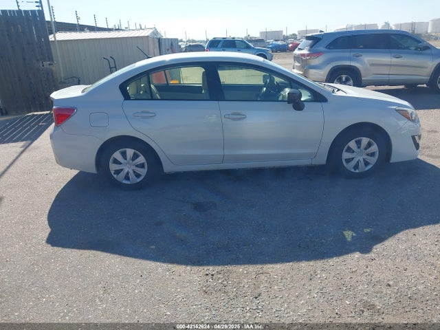 JF1GJAA61GG013965 Subaru Impreza 2.0i