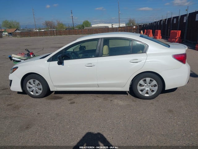 JF1GJAA61GG013965 Subaru Impreza 2.0i