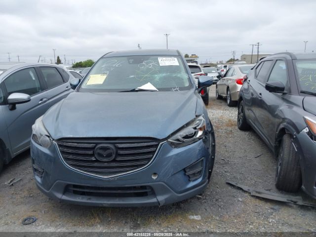 JM3KE2CY2G0699138 Mazda Cx-5 Touring