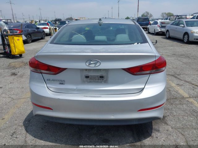KMHD74LFXHU092061 Hyundai ELANTRA SE