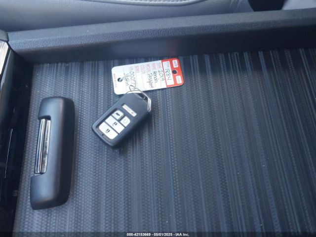 5FNYF8H0XKB000774 Honda Passport Elite