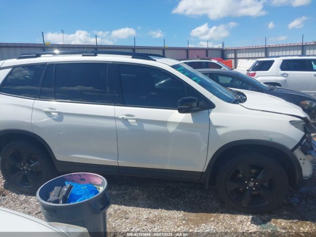 5FNYF8H0XKB000774 Honda Passport Elite